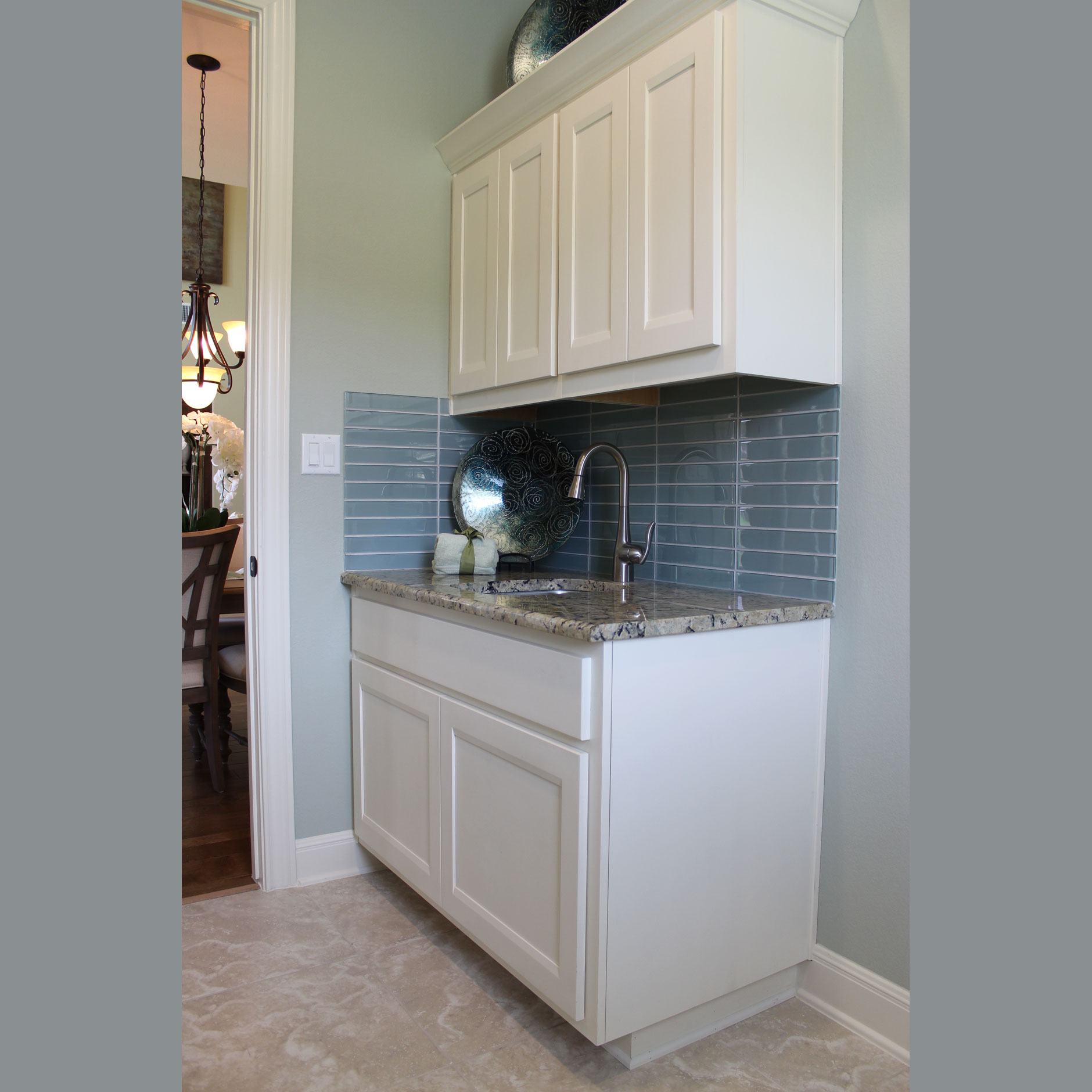 Laundry room cabinets with combination frame cabinet doors MW8 rails and FP1/4 panel in paint grade maple