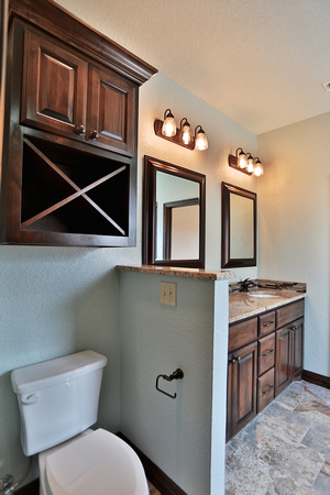 bathroom cabinets in alder with x shaped towel holder