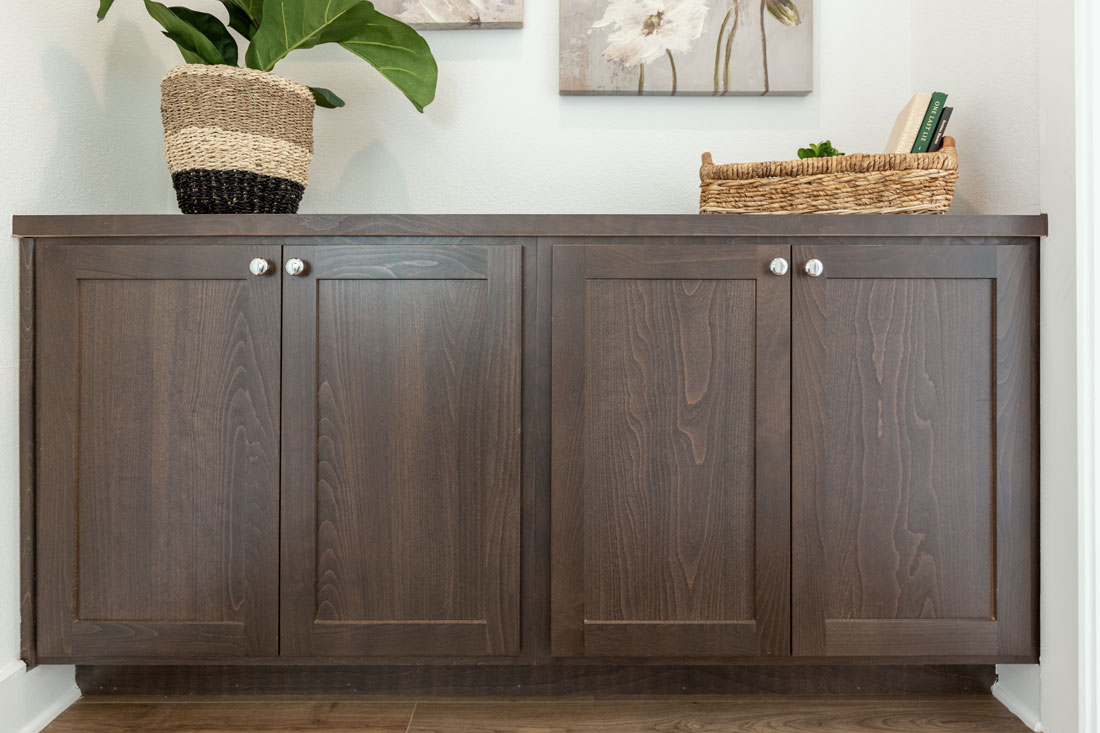Buffet cabinets with cope and stick flat panel doors in beech select with a custom medium stain. 