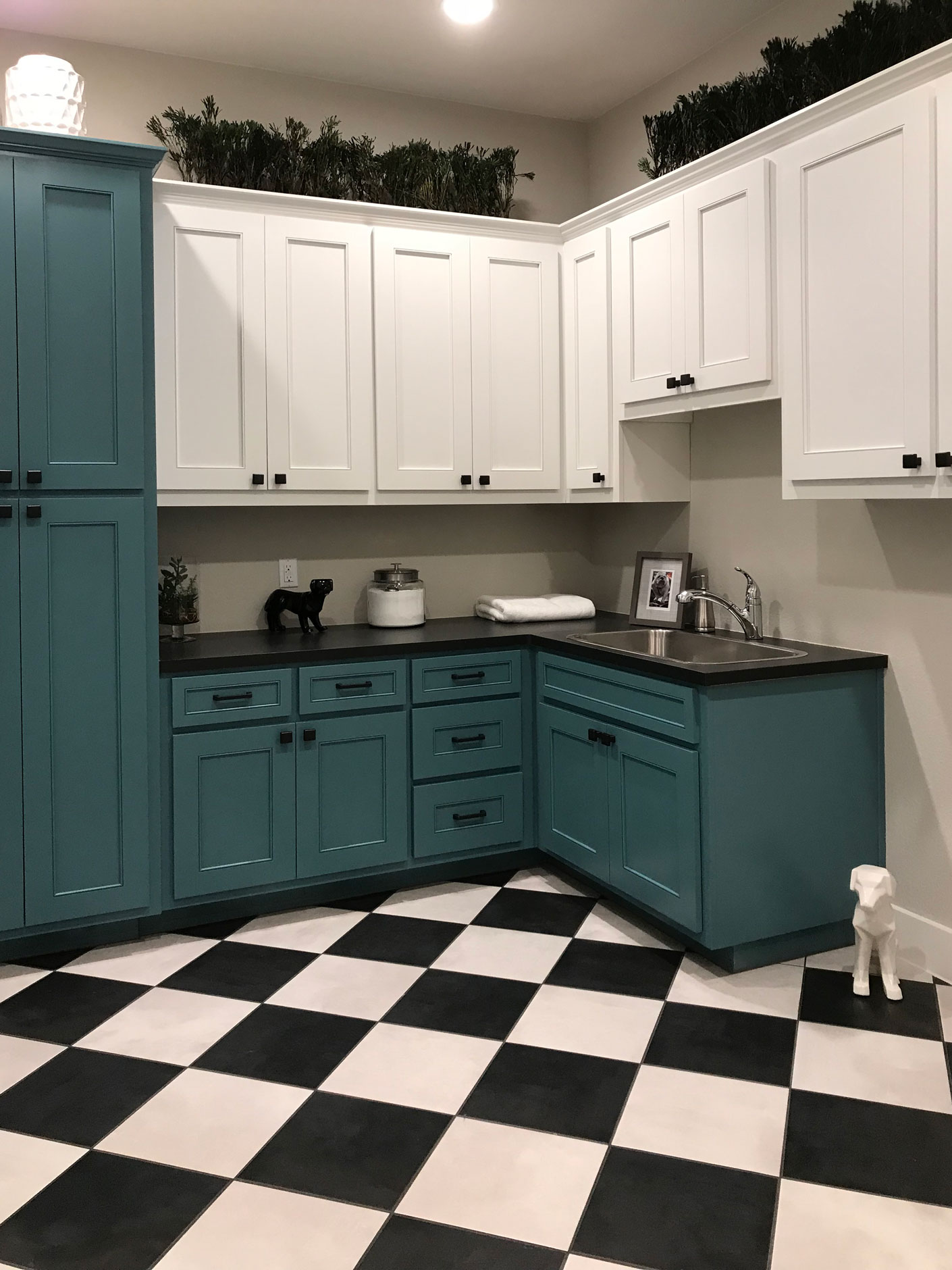 Laundry room with turquoise blue and white cabinets - MW15