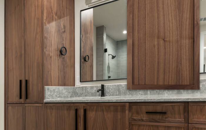 Bathroom vanity in Walnut with TaylorCraft's 4S Slim Shaker door with 3/4" frame
