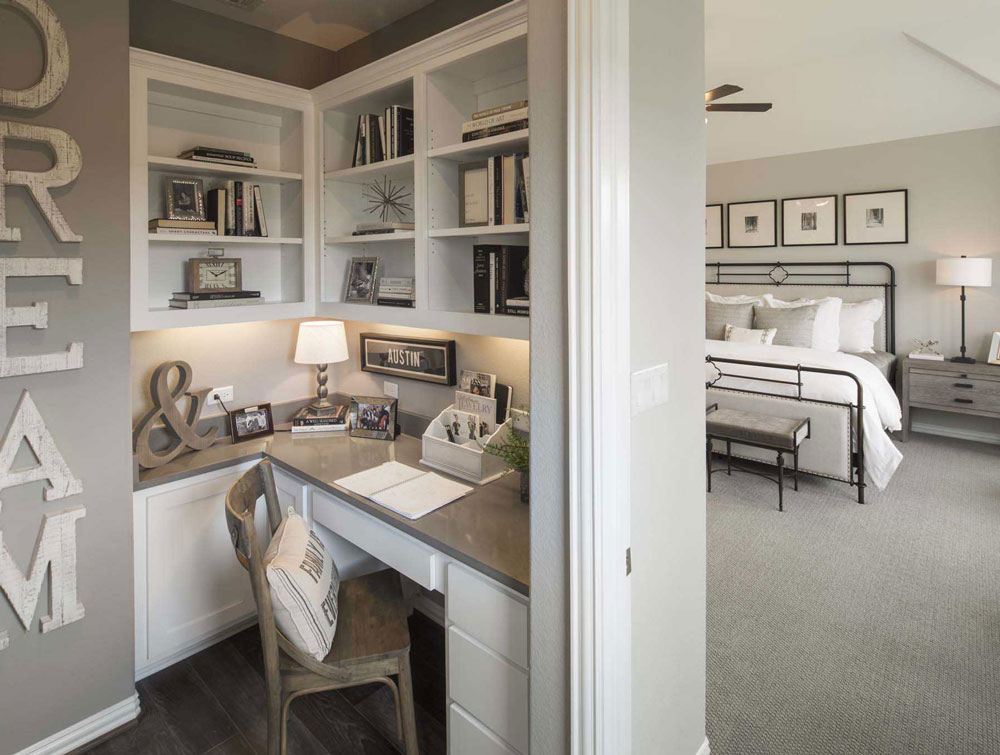 Corner desk with paint grade flat panel cabinet doors, slab drawer fronts and open shelves