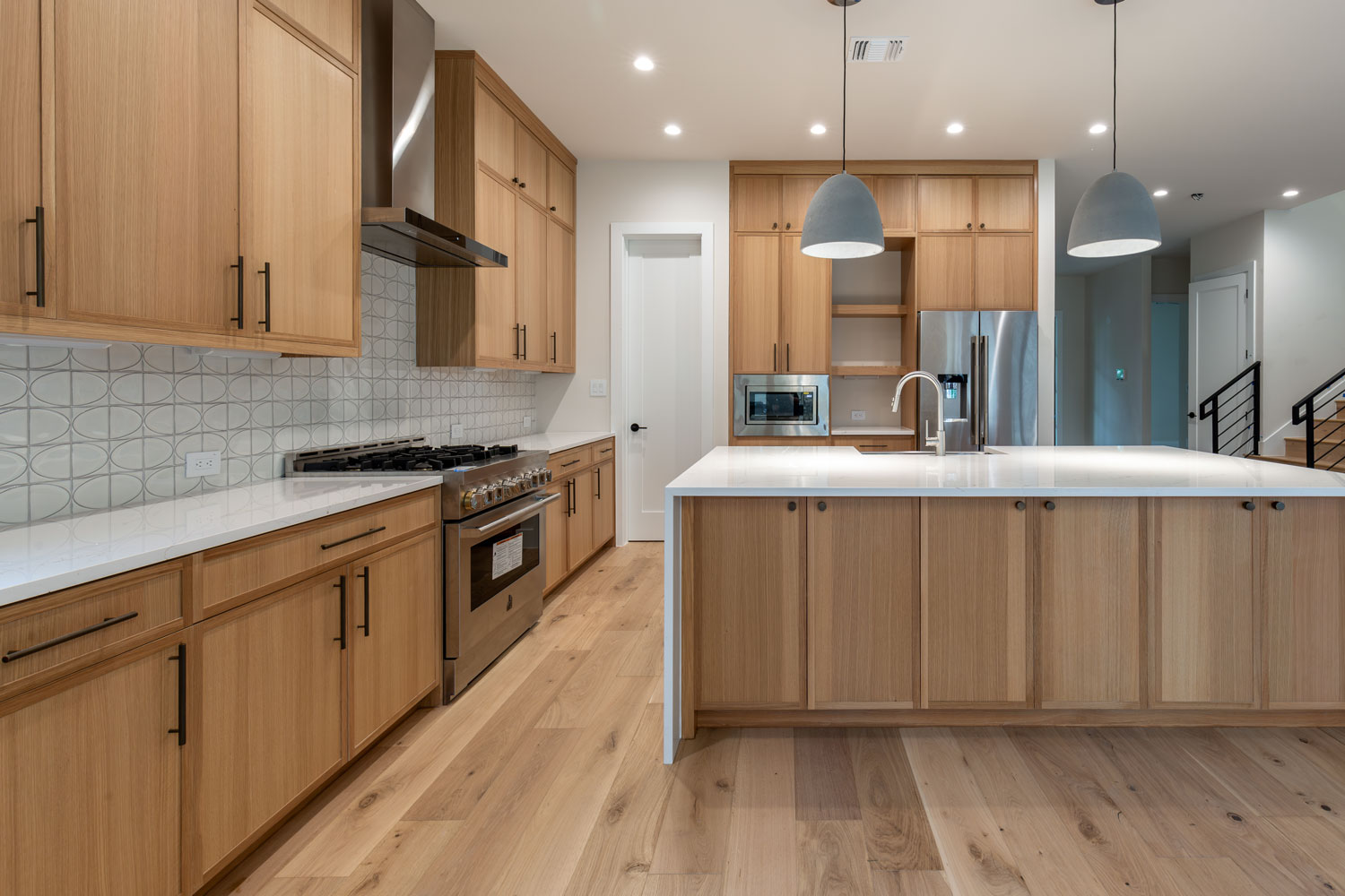 Kitchen with rift white oak 4S 1" Shaker cabinet doors for those looking for slim shaker look without mitered construction