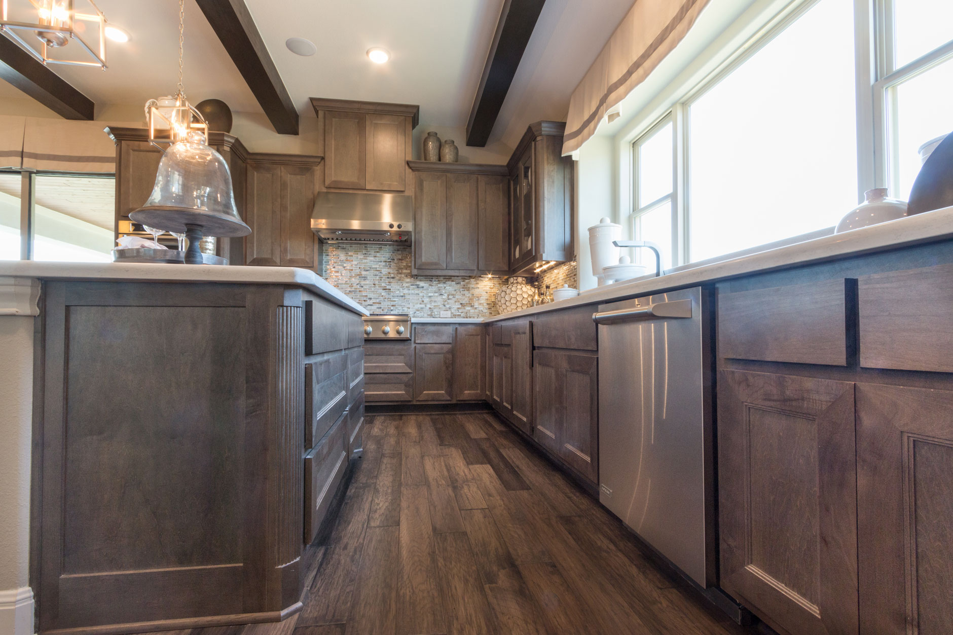 Kitchen with TaylorCraft's mitered cabinet doors MW6 flat panel in hard maple with gray stain