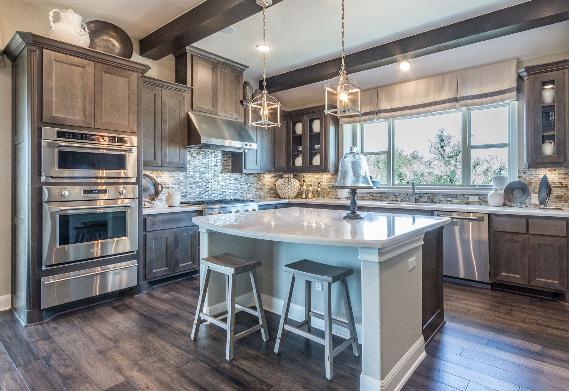 Kitchen with hard maple MW6 flat panel mitered cabinet doors stained driftwood gray