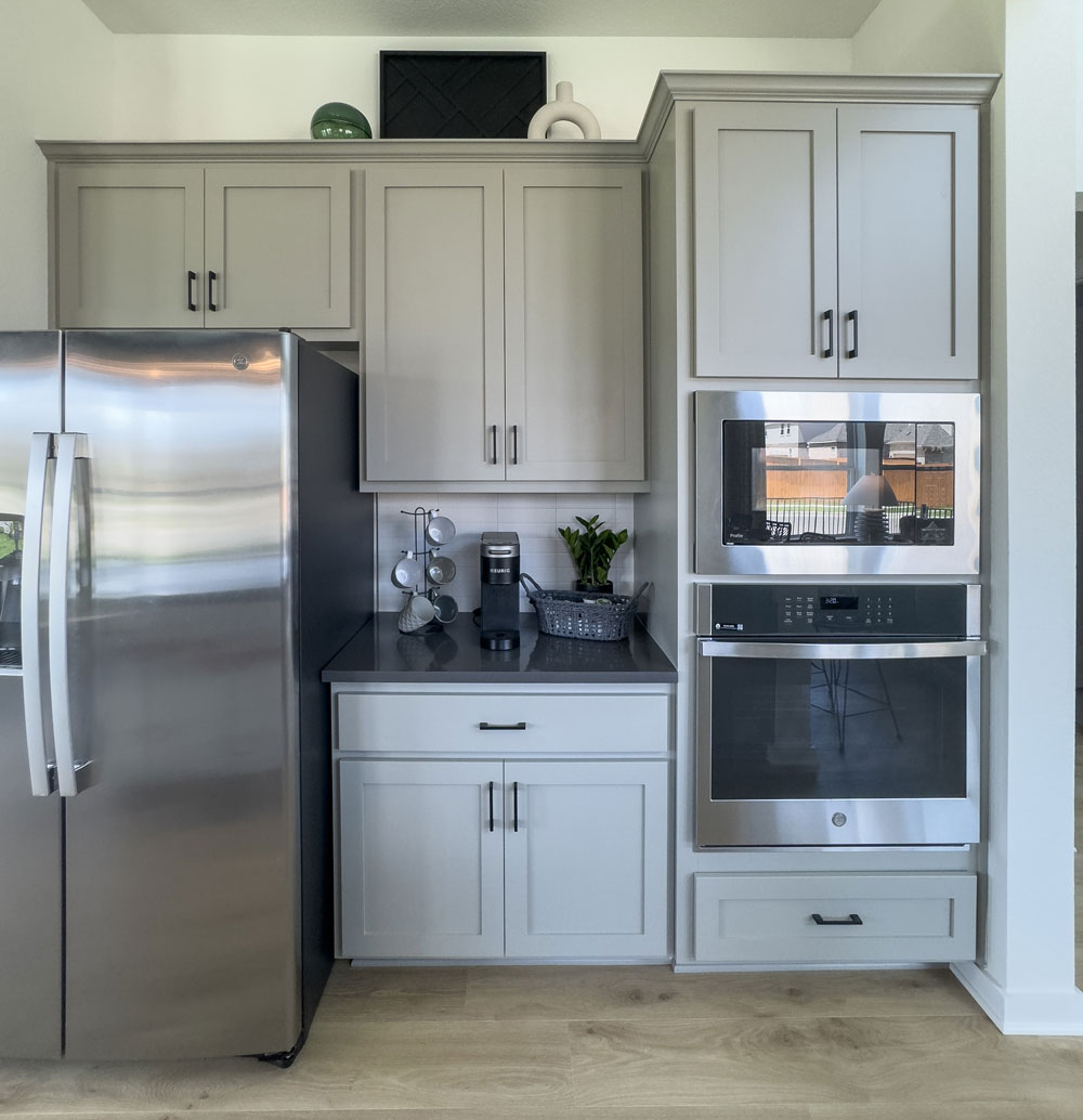 Kitchen cabinets with paint grade Shaker cabinet doors and coffee bar