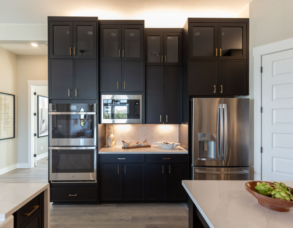 Kitchen with 4S doors in 1" Shaker in paint grade material - painted black by cabinetmaker