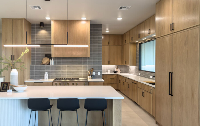 Kitchen with white oak cabinets and 4S cabinet doors with skinny 3/4" Shaker design and subzero refrigerator panels