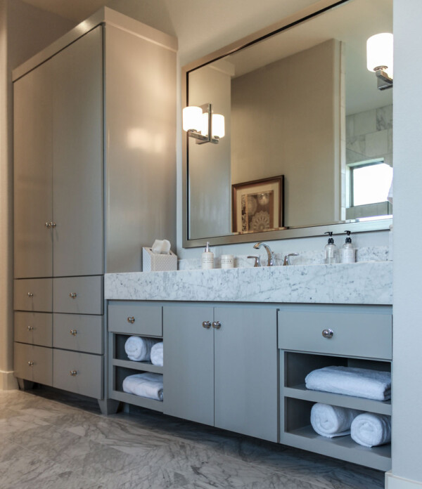 Modern bathroom cabinets with slab paint grade doors and tall linen cabinet